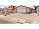 Charming single-story home with a two-car garage and low-maintenance landscaping at 1729 Yellow Rose St, Las Vegas, NV 89108