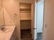 Bathroom area with a vanity and access to the walk-in closet at 1906 Arietta Vista St, Henderson, NV 89044
