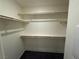 Spacious walk-in closet with shelving and closet rods for organized storage at 1906 Arietta Vista St, Henderson, NV 89044