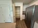 A well-organized kitchen with stainless steel appliances and a pantry at 1906 Arietta Vista St, Henderson, NV 89044