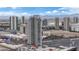 Panoramic aerial view showcases high-rise residences with mountain backdrop and easy access to shopping centers at 200 W Sahara Ave # 603, Las Vegas, NV 89102