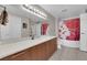 Bright bathroom featuring a shower and vanity with storage at 200 W Sahara Ave # 603, Las Vegas, NV 89102