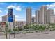 Expansive city view showcasing hotels, palm trees, and vibrant urban landscape at 200 W Sahara Ave # 603, Las Vegas, NV 89102