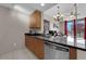 Kitchen with modern appliances and an open concept layout at 200 W Sahara Ave # 603, Las Vegas, NV 89102