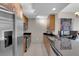 Modern kitchen with stainless steel appliances, granite countertops, and sleek cabinetry at 200 W Sahara Ave # 603, Las Vegas, NV 89102