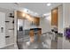 Well-lit kitchen features modern appliances, granite countertops, and ample cabinet space at 200 W Sahara Ave # 603, Las Vegas, NV 89102
