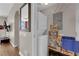 Convenient laundry room with stacked washer and dryer, shelving, and ample storage space at 200 W Sahara Ave # 603, Las Vegas, NV 89102