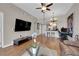 Bright living room with hardwood floors, contemporary decor, and an open layout and a daring dance pole at 200 W Sahara Ave # 603, Las Vegas, NV 89102