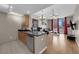 Open concept living space combining kitchen and living room with city views at 200 W Sahara Ave # 603, Las Vegas, NV 89102