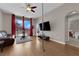 Comfortable living room with hardwood floors, city views, and modern entertainment setup at 200 W Sahara Ave # 603, Las Vegas, NV 89102