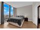 Cozy bedroom featuring a large window with city views at 200 W Sahara Ave # 603, Las Vegas, NV 89102