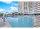 Beautiful sparkling pool with lounge chairs and shade at 200 W Sahara Ave # 603, Las Vegas, NV 89102