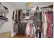 Organized walk-in closet featuring shelving and hanging storage for clothes and accessories at 200 W Sahara Ave # 603, Las Vegas, NV 89102
