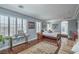 Bright bedroom with hardwood floors, neutral walls, lots of light and decorative accents at 2959 Azure Bay St, Las Vegas, NV 89117