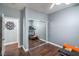 Bright bedroom features hardwood floors, mirrored closet doors, and neutral paint at 2959 Azure Bay St, Las Vegas, NV 89117