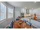 Eat-in kitchen area offers a wooden table with seating and plantation shutters at 2959 Azure Bay St, Las Vegas, NV 89117