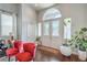 Inviting foyer with soaring ceilings, hardwood floors, and a decorative front door at 2959 Azure Bay St, Las Vegas, NV 89117
