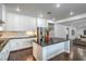 Spacious kitchen with stainless steel appliances, a large island, and modern design at 2959 Azure Bay St, Las Vegas, NV 89117