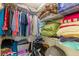 Walk-in closet with ample shelving space for clothes, pillows, and storage at 3125 N Buffalo Dr # 1103, Las Vegas, NV 89128