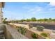 Inviting exterior view with well-maintained landscaping and charming street view at 3125 N Buffalo Dr # 1103, Las Vegas, NV 89128
