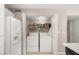 Functional hallway featuring laundry in the closet space at 3125 N Buffalo Dr # 1103, Las Vegas, NV 89128