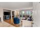 Cozy living room with hardwood floors, modern decor, and balcony access at 3125 N Buffalo Dr # 1103, Las Vegas, NV 89128