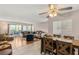 Spacious living room featuring a comfortable couch, stylish decor, and a seamless flow to the outdoor patio at 3125 N Buffalo Dr # 1103, Las Vegas, NV 89128