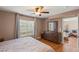 Stylish main bedroom featuring a large window and a matching dresser at 3125 N Buffalo Dr # 1103, Las Vegas, NV 89128