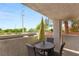 Cozy patio featuring a round table and chairs, perfect for outdoor dining and relaxation at 3125 N Buffalo Dr # 1103, Las Vegas, NV 89128