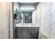 Chic bathroom featuring modern fixtures, a dual-sink vanity, and stylish decor accents at 3145 Tarpon Dr, Las Vegas, NV 89120