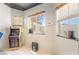 Bright bonus room with natural light and featuring a classic Pac-Personal arcade game at 3145 Tarpon Dr, Las Vegas, NV 89120