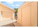 Exterior of detached garage, storage unit, and gated backyard access at 3145 Tarpon Dr, Las Vegas, NV 89120