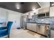 Modern kitchen featuring stainless steel appliances, sleek countertops, and stylish backsplash, designed for functionality at 3145 Tarpon Dr, Las Vegas, NV 89120