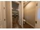 Half bath with a connecting walk in closet at 32 Via Del Fiume, Henderson, NV 89011