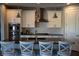 Modern kitchen featuring an island and a gas stove at 32 Via Del Fiume, Henderson, NV 89011