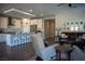 Cozy living room with island and chairs for entertaining at 32 Via Del Fiume, Henderson, NV 89011