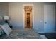 Main bedroom with doorway through to a walk-in closet at 32 Via Del Fiume, Henderson, NV 89011