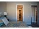 Main bedroom with doorway through to a walk-in closet at 32 Via Del Fiume, Henderson, NV 89011