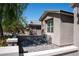 Cozy outdoor patio area with stone pavers, perfect for relaxing or entertaining guests in style at 32 Via Del Fiume, Henderson, NV 89011