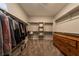 Spacious walk-in closet features custom shelving units and ample storage space at 32 Via Del Fiume, Henderson, NV 89011