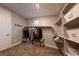 Well-organized walk-in closet with shelving, hanging rods, and drawers at 32 Via Del Fiume, Henderson, NV 89011