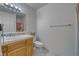 Functional bathroom featuring vanity with tile counters, a toilet, and combined shower and tub at 3581 Margarita Ave, Pahrump, NV 89048