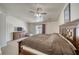 Spacious main bedroom features carpet flooring, ceiling fan, and closet with natural light at 3581 Margarita Ave, Pahrump, NV 89048