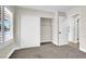 Bedroom featuring carpet, a closet with sliding doors, and a window at 4270 Wendy Ln, Las Vegas, NV 89115