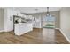 Updated kitchen with white cabinets, stainless steel appliances, and an island at 4270 Wendy Ln, Las Vegas, NV 89115