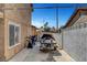 Wide side yard featuring a boat on a trailer and a house with white-trimmed windows at 4990 Spring Oak St, Las Vegas, NV 89120