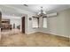 A dining area showcases elegant tile flooring and seamlessly connects to an inviting living space at 4990 Spring Oak St, Las Vegas, NV 89120