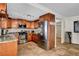 Spacious kitchen with granite countertops, stainless steel appliances, and plenty of cabinet space at 4990 Spring Oak St, Las Vegas, NV 89120
