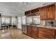 Updated kitchen with granite countertops, stainless steel appliances, and eat-in dining area at 4990 Spring Oak St, Las Vegas, NV 89120