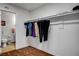 Well-organized walk-in closet with plenty of hanging space and easy access to the half bath at 4990 Spring Oak St, Las Vegas, NV 89120